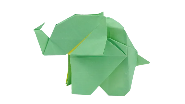 An elephant folded from green paper